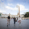 Three female students walking in Piazza del Popolo